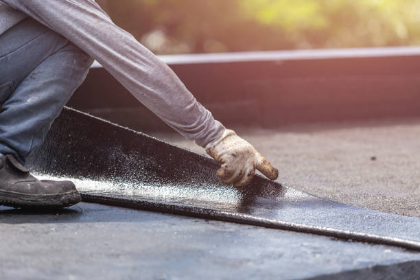 Professional Exterior Waterproofing technician working in Springfield, IL